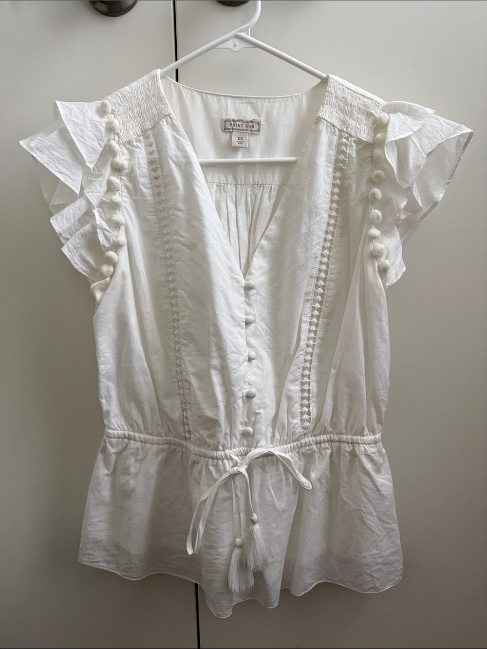 Point Sur White V-Neck Tie-Waist Blouse with Pom Trim